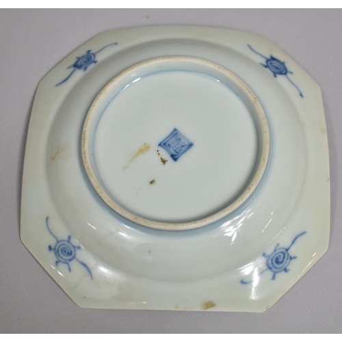 317 - A Oriental Blue and White Porcelain Shaped Dish, Dragon Chasing Flaming Pearl Design with Floral Blu... 