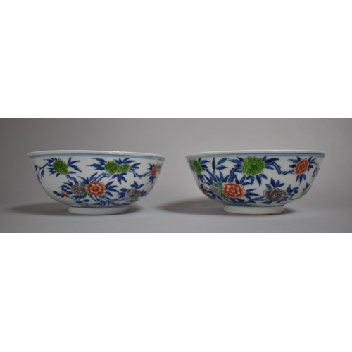 318 - A Pair of 19th Century Chinese Porcelain Bowls decorated in the Wucai Palette with Blossoming Branch... 