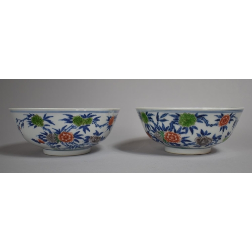 318 - A Pair of 19th Century Chinese Porcelain Bowls decorated in the Wucai Palette with Blossoming Branch... 