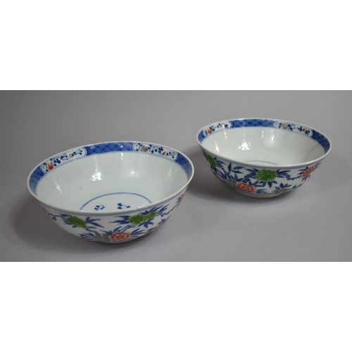 318 - A Pair of 19th Century Chinese Porcelain Bowls decorated in the Wucai Palette with Blossoming Branch... 