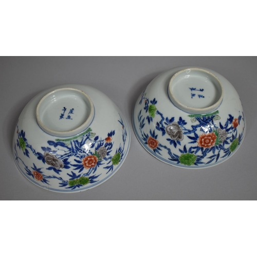 318 - A Pair of 19th Century Chinese Porcelain Bowls decorated in the Wucai Palette with Blossoming Branch... 