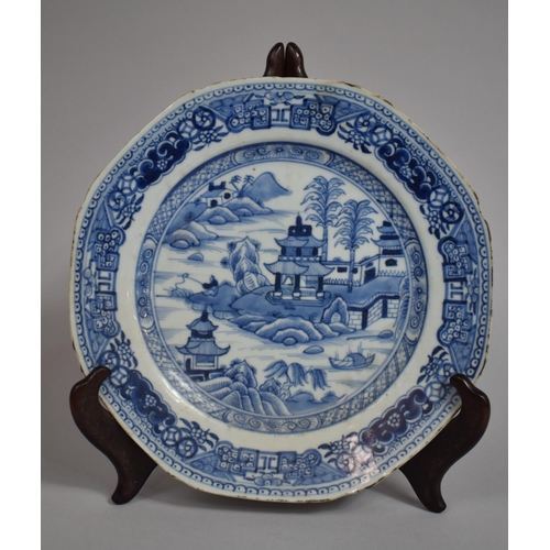 310 - A Chinese 18th/19th century Blue and White Export Plate, River Village Scene. 23.5cms Diameter