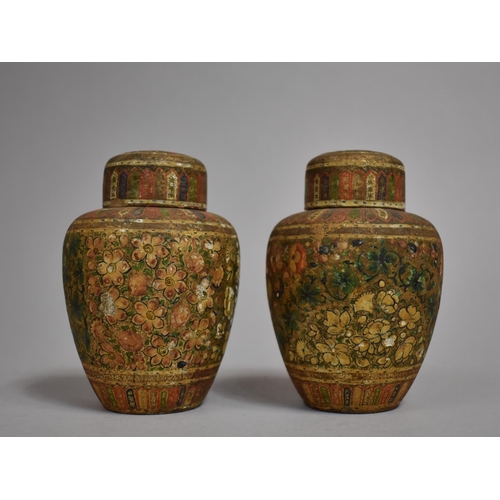 69 - A Pair of Small Kashmiri Baluster Vases and Covers Decorated in Polychrome Enamels, 10.5cms High