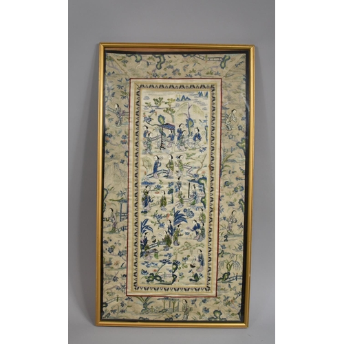 222 - A Framed Chinese Silk Embroidered Sleeve Panel Depicting Maidens in Exterior Garden Setting.