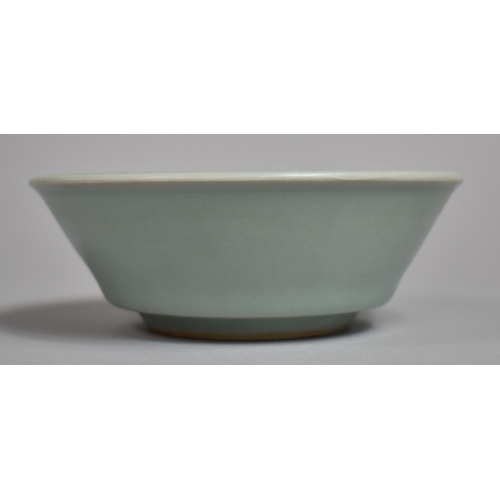 359 - A Chinese Celadon Glaze Bowl, Crackle Glazed, 13cms Diameter.