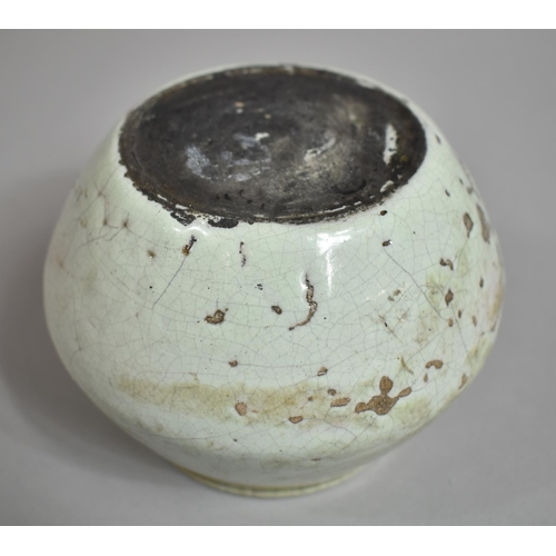 355 - A Chinese Monochromatic Celadon Glazed Pot, 10cms High, Loss to Glaze in Parts