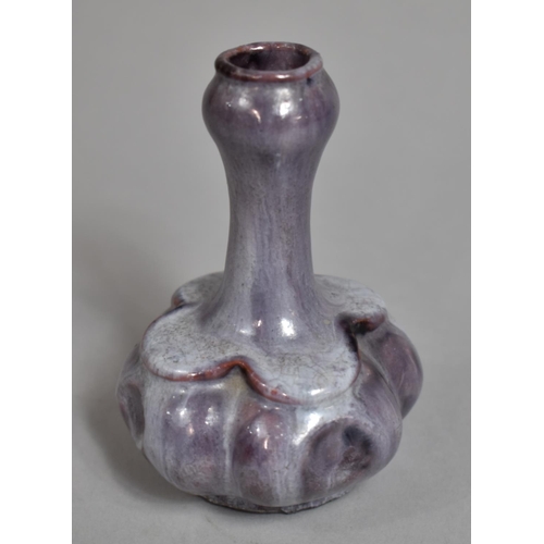 351 - A Chinese Jun Ware Glazed Bottle Vase of Shaped Bellied Form, Purple Streaked Glaze. 10cms High