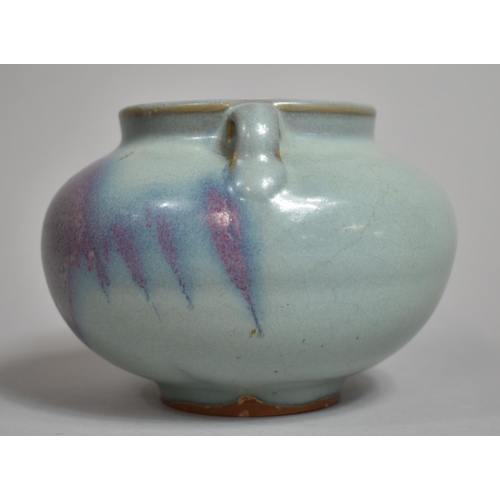 350 - A Chinese Jun Ware Splash Jar, Squat Bellied Form, with Twin Handles, Purple and Blue Glaze. 9.5cms ... 