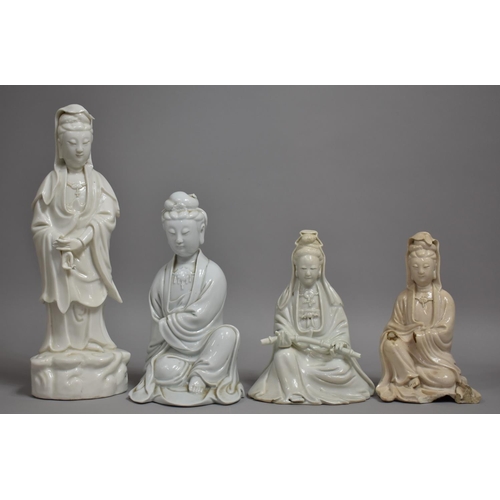 341 - Four Chinese Blanc De Chine Porcelain Figures of Guanyin, Three in Seated Position and One Standing.... 