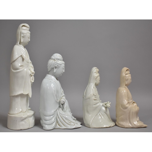 341 - Four Chinese Blanc De Chine Porcelain Figures of Guanyin, Three in Seated Position and One Standing.... 