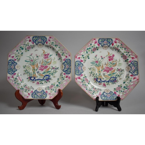 324 - A Pair of Chinese Porcelain Export Plates of Octagonal Form decorated in the Famille Rose Palette wi... 