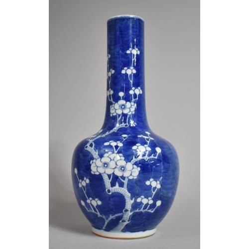 301 - A 19th Century Chinese Blue and White Prunus Pattern Vase of Bottle Form, Double Concentric Mark to ... 