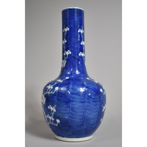 301 - A 19th Century Chinese Blue and White Prunus Pattern Vase of Bottle Form, Double Concentric Mark to ... 