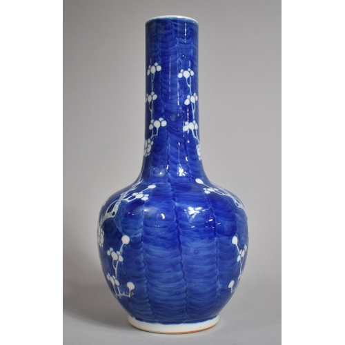 301 - A 19th Century Chinese Blue and White Prunus Pattern Vase of Bottle Form, Double Concentric Mark to ... 