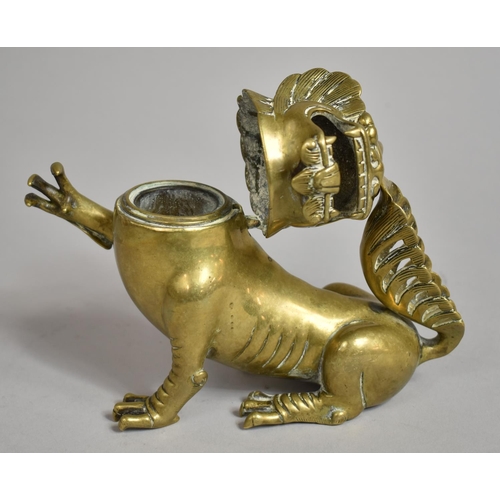 262 - A Chinese Bronze Incense Burner in the Form of a Snarling Temple Lion in Seated Position with Right ... 