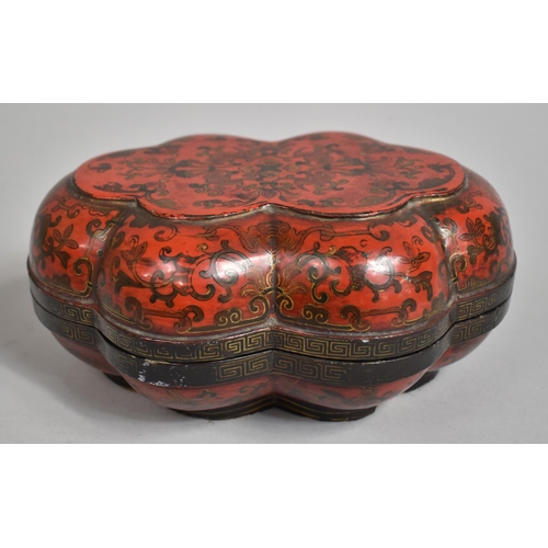 249 - A 19th Century Lacquered Box and Cover with Scalloped Edge decorated with Bats and Scrolls on Red Gr... 