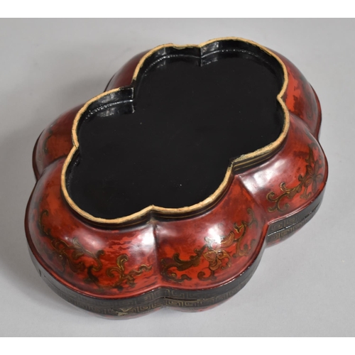 249 - A 19th Century Lacquered Box and Cover with Scalloped Edge decorated with Bats and Scrolls on Red Gr... 