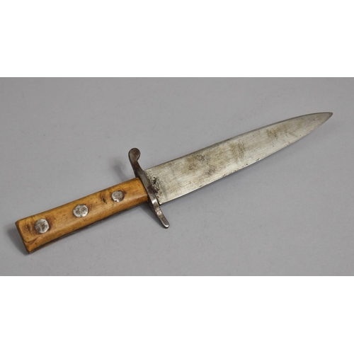 31 - A Vintage Hunting Knife in Leather Sheath