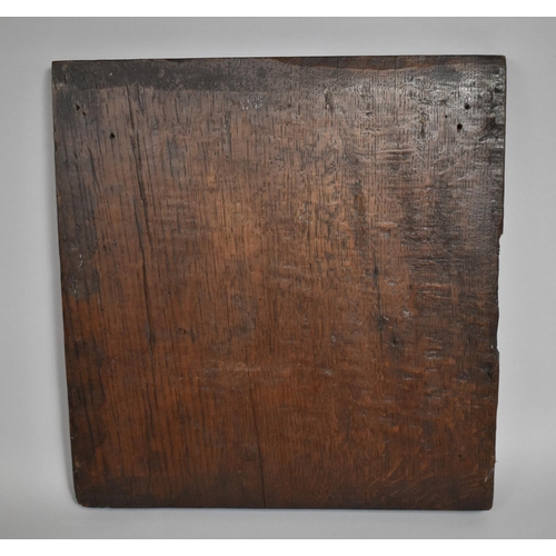 52 - A 17th Century Carved Oak panel. 38x40cms