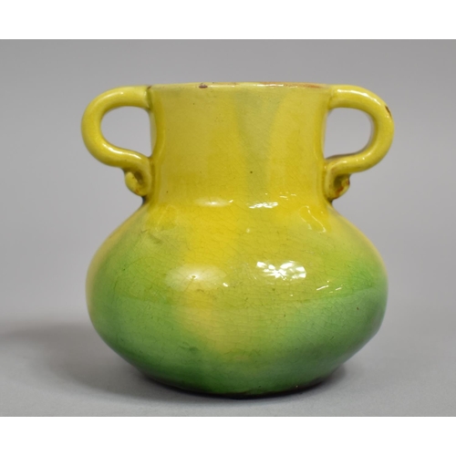 437 - A Small CH Brannam Pottery Two Handled Vase, Produced for Liberty and Co. Green and Yellow Glaze, Im... 