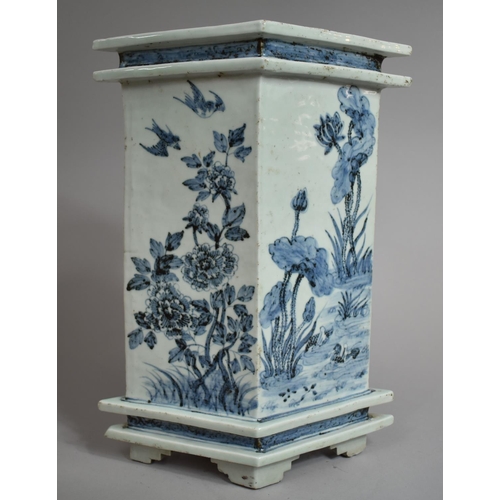 298 - A Large Chinese Blue and White Vase of Lozenge Form. raised on Four Bracket Feet, Floral Decoration ... 