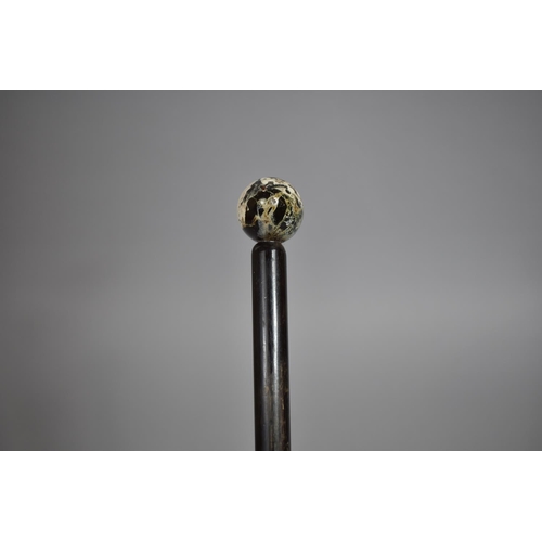 43 - A 19th Century Walking Cane with a Cornish Serpentine Handle and Ebony Shaft, 73cms Long