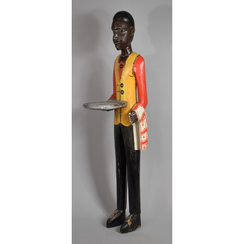 50 - A British Colonial African Carved Wooden Visiting Card Stand Modelled as a Liveried Waiter, with Ori... 