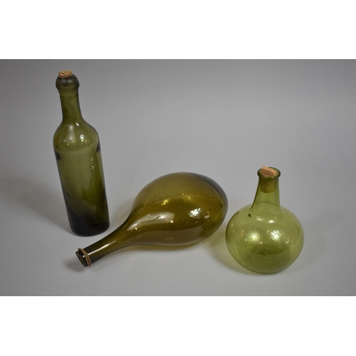 212 - Three 19th Century Free Blown Coloured Glass Bottles, The Largest 28cms High