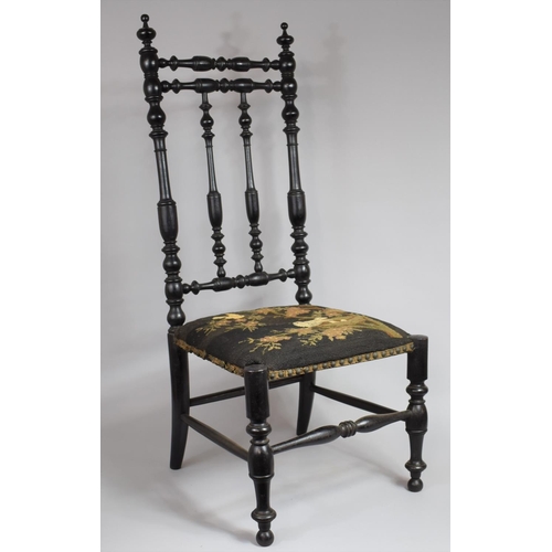 470 - A 19th Century Ebonised Bobbin Turned Chair, with The Original Decorative Tapestry Seat, 39cms High