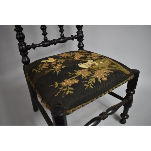 470 - A 19th Century Ebonised Bobbin Turned Chair, with The Original Decorative Tapestry Seat, 39cms High