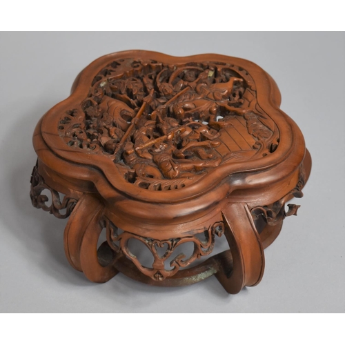 241 - A Chinese Ornately Carved and Pierced Wooden Scalloped Edge Stand decorated to Top with Battle Scene... 