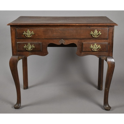 6 - A 19th Century Oak Lowboy with Long Drawer over Two Small Drawers, 82x48x72cms High