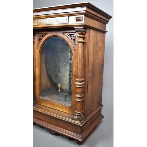 80 - A 19th Century Walnut Cased Upright Symphonium, working order.