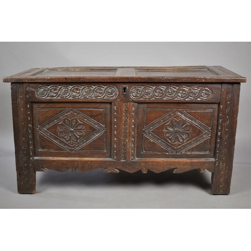 464 - An Early Oak Two Panelled Lift Top Coffer of Small Proportions with Carved Rosette Decoration to Fro... 