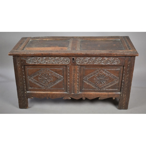 464 - An Early Oak Two Panelled Lift Top Coffer of Small Proportions with Carved Rosette Decoration to Fro... 