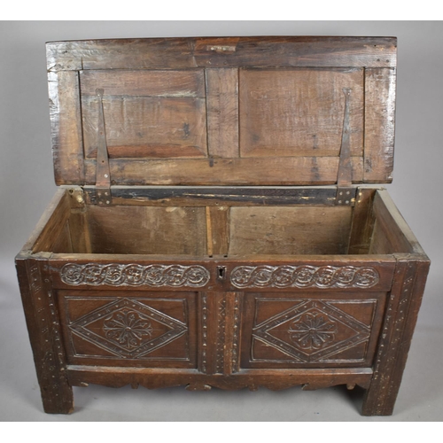 464 - An Early Oak Two Panelled Lift Top Coffer of Small Proportions with Carved Rosette Decoration to Fro... 