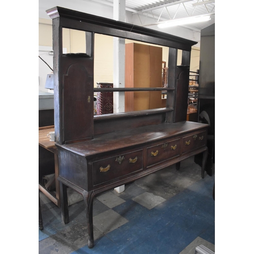 469 - A 19th Century Oak Three Drawer Dresser on Cabriole Front Supports. Raised Plate Rack with Two Side ... 