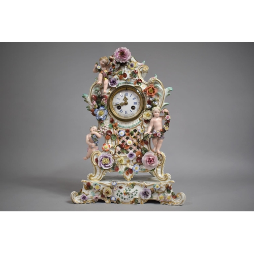 441 - A Meissen Porcelain Mantle Clock decorated with Applied Bocage Flower and Cherubs Raised on Scrolled... 