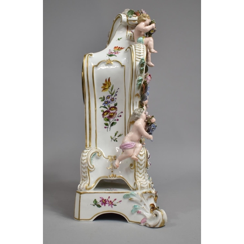 441 - A Meissen Porcelain Mantle Clock decorated with Applied Bocage Flower and Cherubs Raised on Scrolled... 