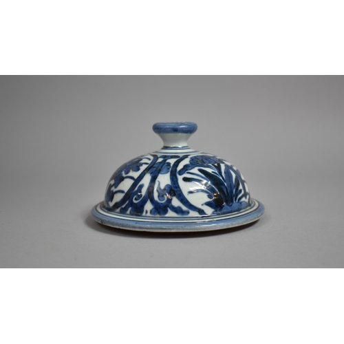 449 - A Japanese Blue and White Vase Lid, 16cms Diameter (Hairline)