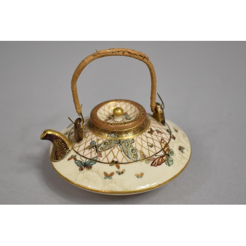 450 - A Japanese Satsuma Miniature Teapot of Compressed Circular Form and Decorated with Butterflies, Wire... 