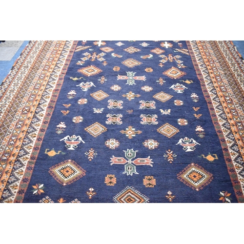 240 - A Very Large Woollen Carpet Square on Blue Ground, 483x252cm