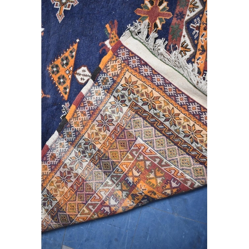 240 - A Very Large Woollen Carpet Square on Blue Ground, 483x252cm