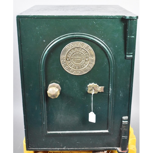 451 - A Late Victorian/Edwardian Fire Proof Safe. The 'Hold Fast' Safe by Walker and Son. With Key. 50x54x... 