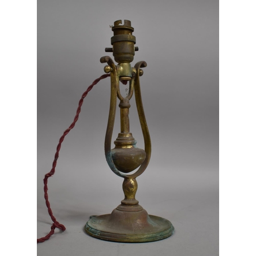 31 - A Gimballed Brass Table Lamp, 31cm High
