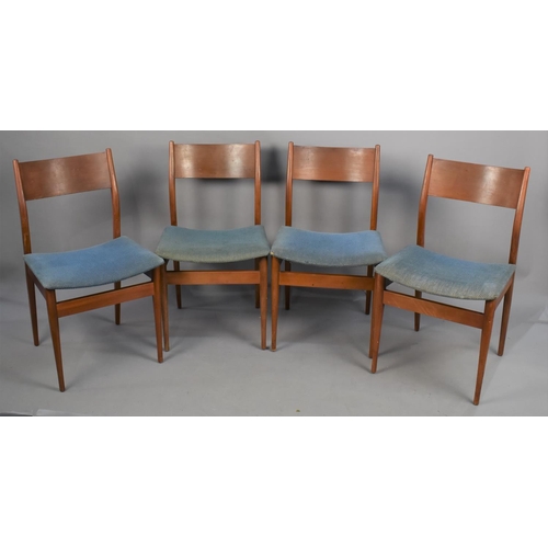 538 - A Set of Four 1960's Uniflex Teak Dining Chairs of Danish Design