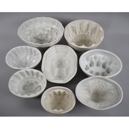 57 - A Collection of Late 19th and Early 20th Century White Glazed Ceramic Jelly Moulds
