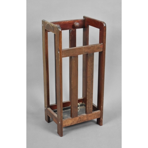 64 - An Edwardian Wooden Stick Stand with Metal Drip Tray, 25cm wide and 55cm high