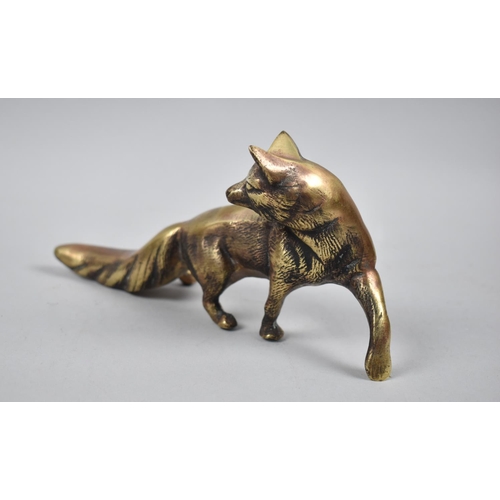 20 - A Heavy Cast Brass Study of a Fox, 21cm Long