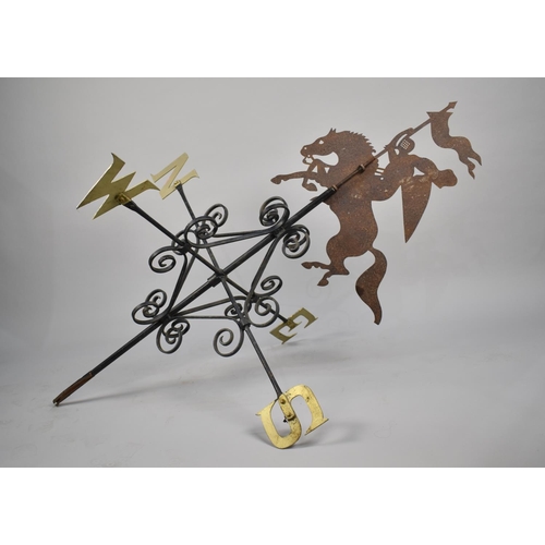 444 - A Large Wrought Iron Weathervane with Jousting Knight Pediment